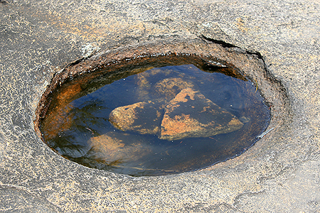 Drill hole with grinding cobbles, Bald Rock Creek, near The Junction.