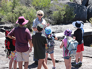 Jo leading a group on a guided walk.