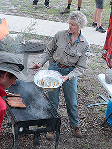 Sue sizzling sausages.