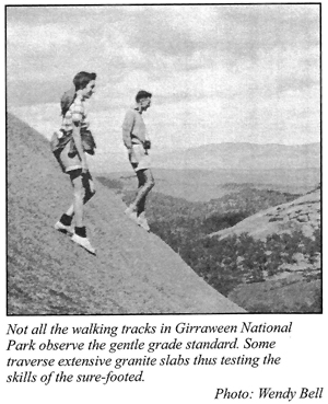 Sure-footed hikers on a very steep slope.