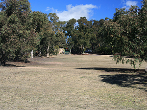 There is a large, open area between the picnic tables and the Information Centre.