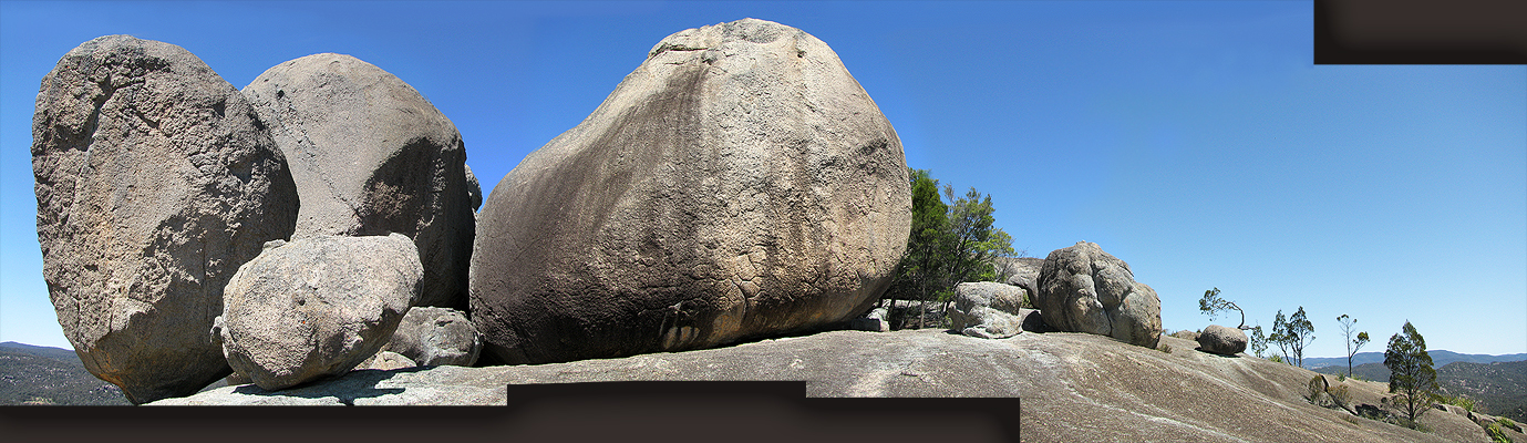 Balancing Rock (far left) is just one of many boulders on top of The Pyramid.