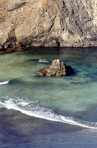 Closer view of water and rocks.